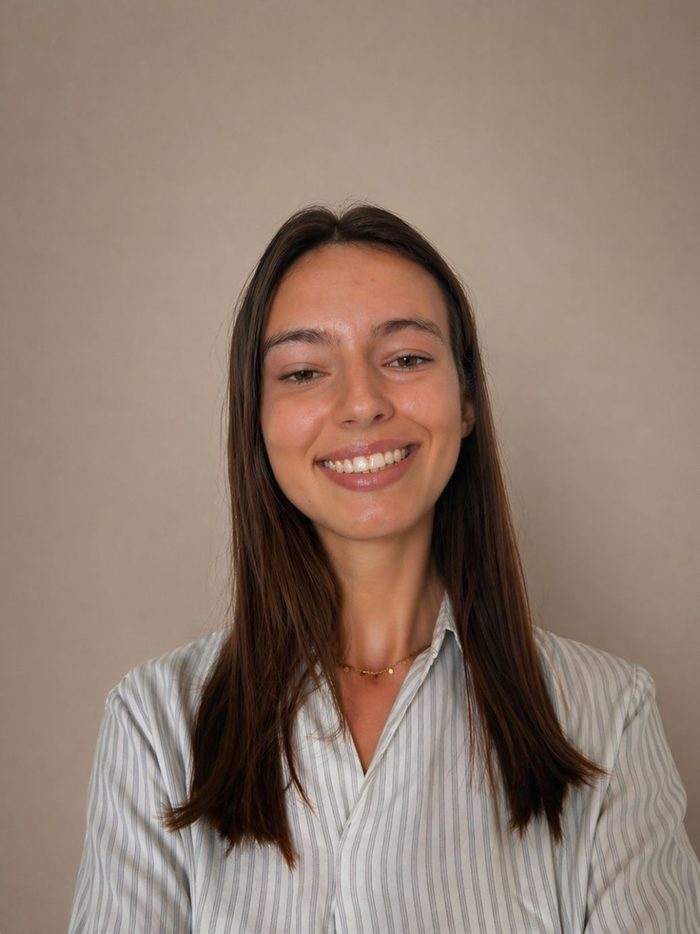 The same photo, refined with better lighting and a warm, polished studio-style background.